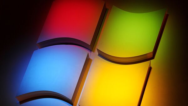 The Windows Logo at a Microsoft press conference at the 2011 International Consumer Electronics Show January 5, 2011 in Las Vegas, Nevada. - Sputnik Afrique