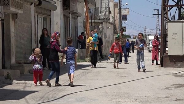 A Homs, la vie reprend son cours - Sputnik Afrique