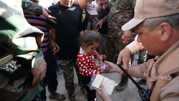 Distribution d'aide humanitaire russe en Syrie - Sputnik Afrique