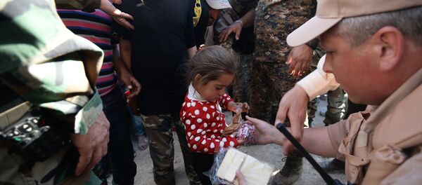 Distribution d'aide humanitaire russe en Syrie - Sputnik Afrique