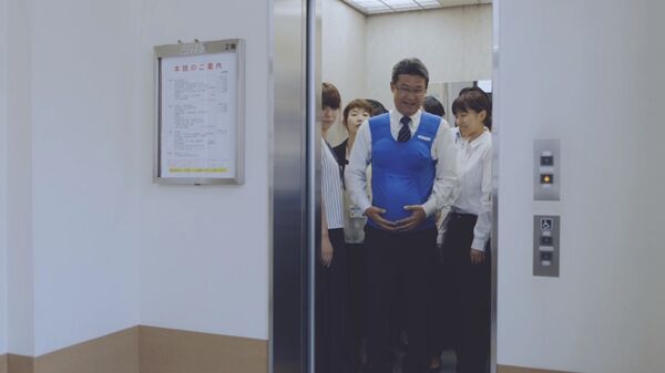 Les élus japonais portent un ventre de femme enceinte - Sputnik Afrique