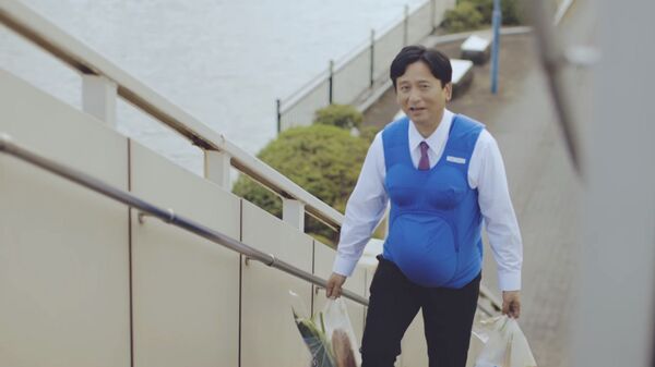 Un homme portant la veste - Sputnik Afrique