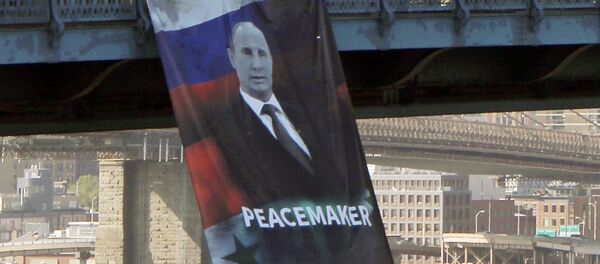 Une bannière avec «Poutine pacificateur» agite New York - Sputnik Afrique