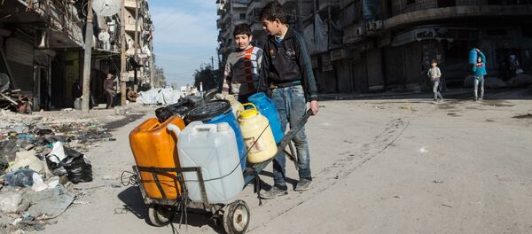 Des habitants d'Alep - Sputnik Afrique