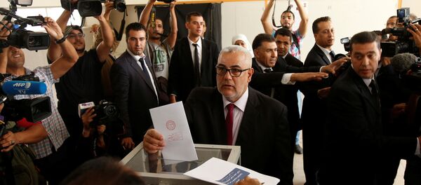 Abdelillah Benkirane, secretary-general of the Islamist Justice and Development party (PJD), casts his ballot at a polling station in Rabat October 7, 2016. - Sputnik Afrique
