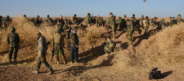 Peshmerga forces gather in the east of Mosul to attack Islamic State militants in Mosul, Iraq, October 17, 2016. - Sputnik Afrique