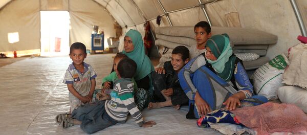 Réfugiés ayant fui Mossoul - Sputnik Afrique