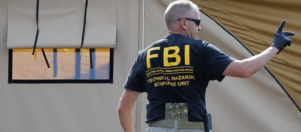 Un agent du FBI Un agent du FBI - Sputnik Afrique