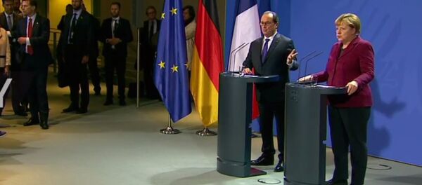 Conférence de presse Hollande-Merkel après les entretiens de Berlin sur la Syrie - Sputnik Afrique