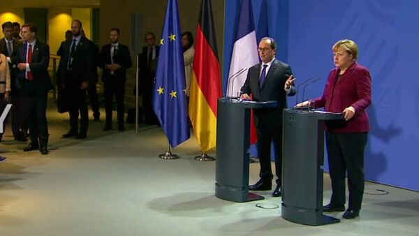 Conférence de presse Hollande-Merkel après les entretiens de Berlin sur la Syrie - Sputnik Afrique