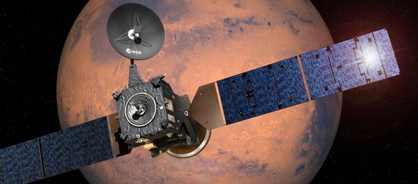 This image provided by the European Space Agency, ESA, shows an artist·s impression depicting the separation of the ExoMars 2016 entry, descent and landing demonstrator module, named Schiaparelli, from the Trace Gas Orbiter, and heading for Mars This image provided by the European Space Agency, ESA, shows an artist·s impression depicting the separation of the ExoMars 2016 entry, descent and landing demonstrator module, named Schiaparelli, from the Trace Gas Orbiter, and heading for Mars - Sputnik Afrique