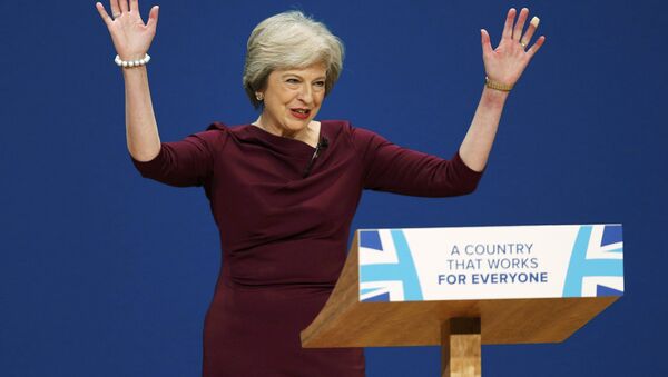 Britain's Prime Minister Theresa May gives her speech on the final day of the annual Conservative Party Conference in Birmingham, Britain, October 5, 2016. - Sputnik Afrique