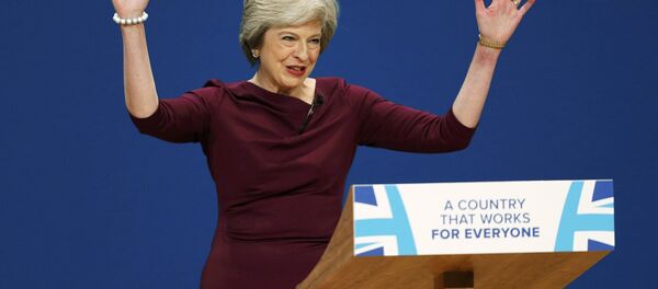 Britain's Prime Minister Theresa May gives her speech on the final day of the annual Conservative Party Conference in Birmingham, Britain, October 5, 2016. - Sputnik Afrique
