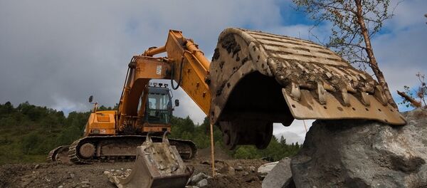 Un excavateur - Sputnik Afrique