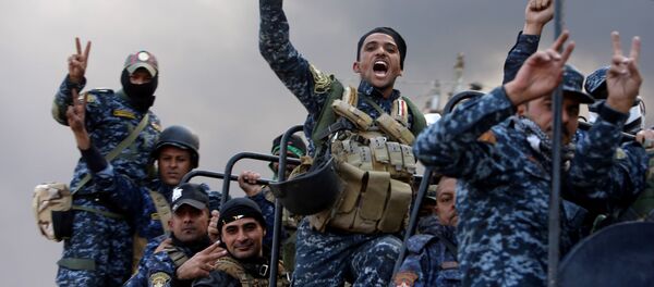 Des militaires irakiens participant à la libération de Mossoul - Sputnik Afrique