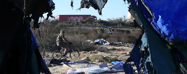 Flüchtlingslager in Calais Flüchtlingslager in Calais - Sputnik Afrique