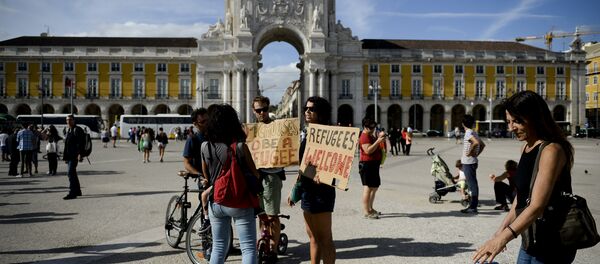 Une manifestation de soutien aux migrants à Lisbonne - Sputnik Afrique