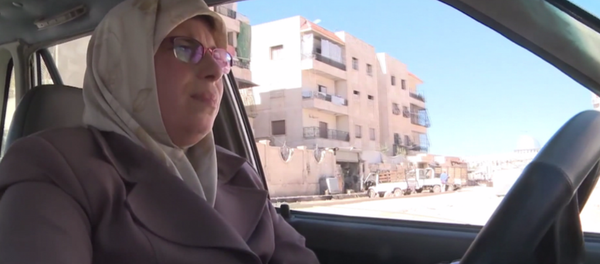 Aminour, l’unique femme chauffeur de taxi à Alep - Sputnik Afrique