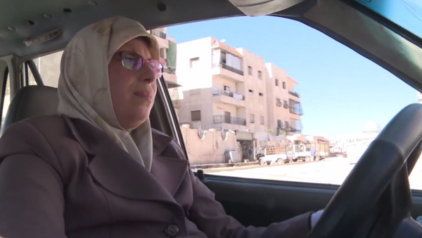 Aminour, l’unique femme chauffeur de taxi à Alep - Sputnik Afrique