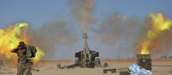 Les Forces de mobilisation populaire tirent contre les terroristes de Daech près de Mossoul - Sputnik Afrique