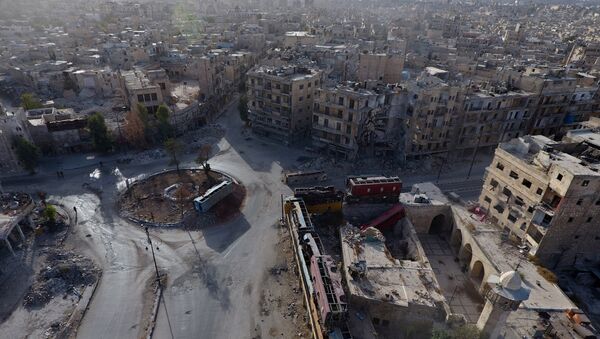 A general view taken with a drone shows the damage in the rebel-held Bab al-Hadid neighbourhood of Aleppo, Syria, October 13, 2016. - Sputnik Afrique