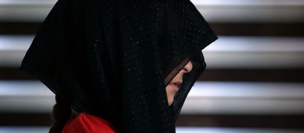 A displaced Iraqi youth from the Yazidi community poses for a picture in the northern Iraqi town of Dohuk on May 20, 2015. - Sputnik Afrique