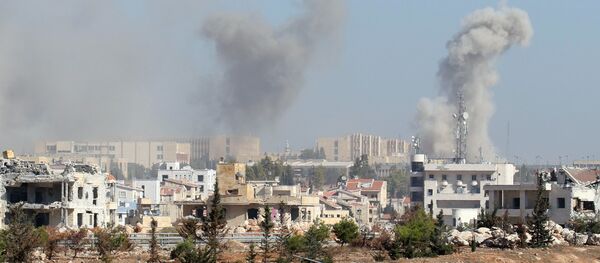 Smoke rises from government-controlled New Aleppo neighbourhood, western Aleppo city, Syria November 3, 2016. - Sputnik Afrique