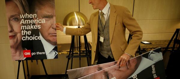 A man moves signs after a U.S. Election Watch event hosted by the U.S. Embassy at a hotel in Seoul, South Korea, November 9, 2016. A man moves signs after a U.S. Election Watch event hosted by the U.S. Embassy at a hotel in Seoul, South Korea, November 9, 2016. - Sputnik Afrique