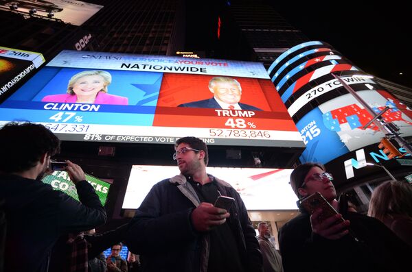 Les citoyens sur Times Square à New York - Sputnik Afrique