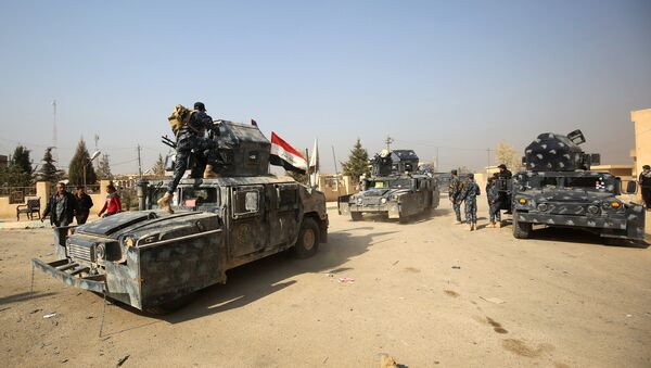 Les forces irakiennes patrouillent la région de Hammam al-Alil - Sputnik Afrique