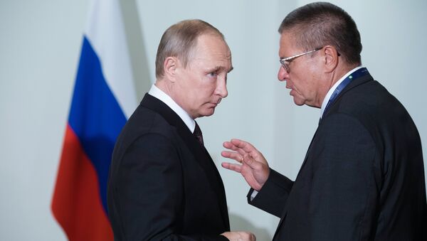 Vladimir Poutine et Alekseï Oulioukaïev - Sputnik Afrique