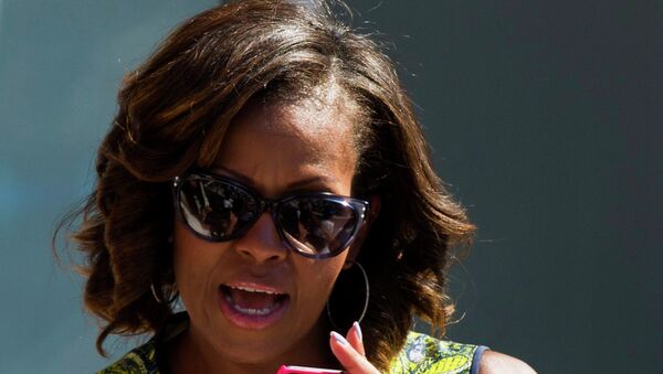 First Lady Michelle Obama attends the 18th Annual Arthur Ashe Kids’ Day, the kick off to the 2013 US Open tennis tournament, on Saturday, Aug. 24, 2013 in New York - Sputnik Afrique