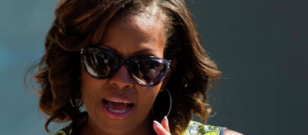 First Lady Michelle Obama attends the 18th Annual Arthur Ashe Kids’ Day, the kick off to the 2013 US Open tennis tournament, on Saturday, Aug. 24, 2013 in New York - Sputnik Afrique
