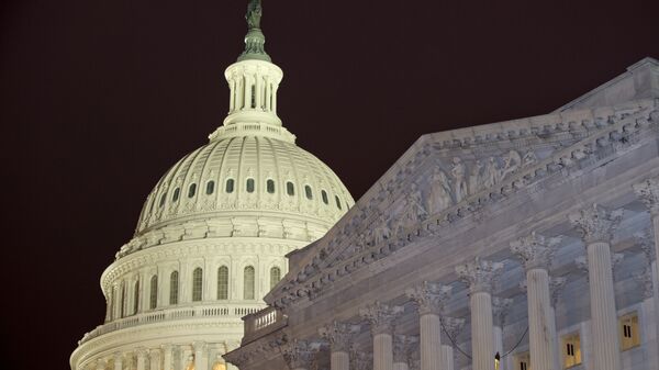 The United States Capitol dome is to the left of the United States Senate, on Capitol Hill Wednesday, Feb. 27, 2013 - Sputnik Afrique