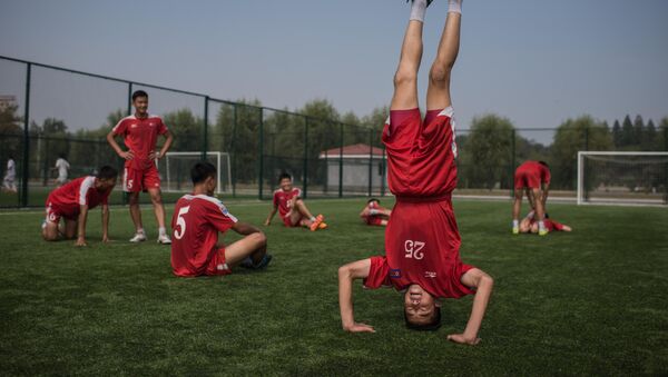 Des élèves de l'Ecole internationale de foot de Pyongyang - Sputnik Afrique