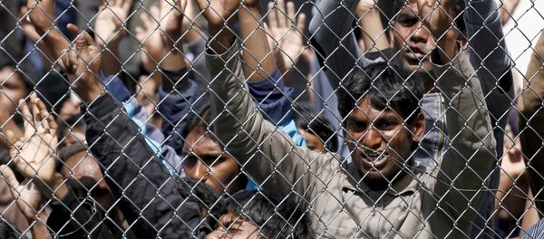 Des migrants - Sputnik Afrique