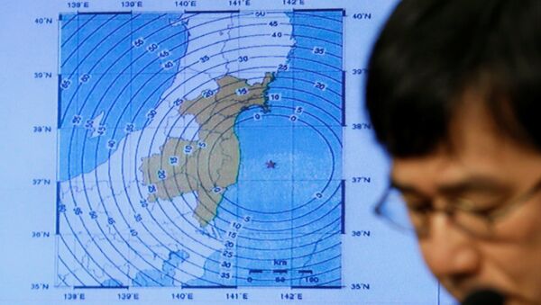 Japan Meteorological Agency's earthquake and volcano observations division director Koji Nakamura addresses a news conference next to the map showing an earthquake epicentre off the coast of Fukushima prefecture, in Tokyo, Japan November 22, 2016. - Sputnik Afrique