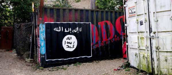 A Daesh flag - Sputnik Afrique