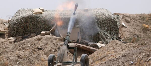 Un combattants des FDS près de Raqqa - Sputnik Afrique