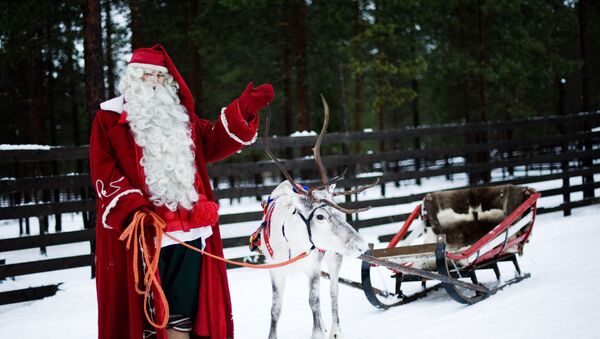 Le père Noël avec ses rennes - Sputnik Afrique