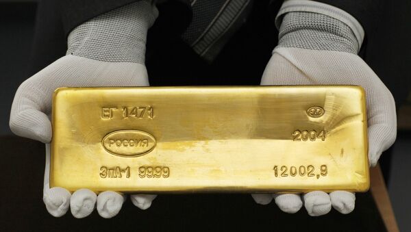 Une barre d'or de la collection des métaux et des pierres précieuses de l'État russe - Sputnik Afrique