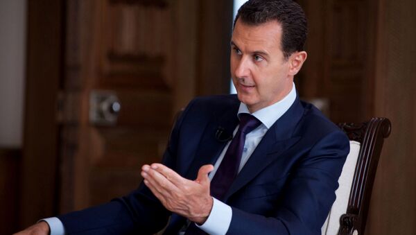 In this photo released on July 1, 2016, by the Syrian official news agency SANA, Syrian President Bashar Assad speaks during an interview with Australia's SBS news channel, in Damascus, Syria - Sputnik Afrique