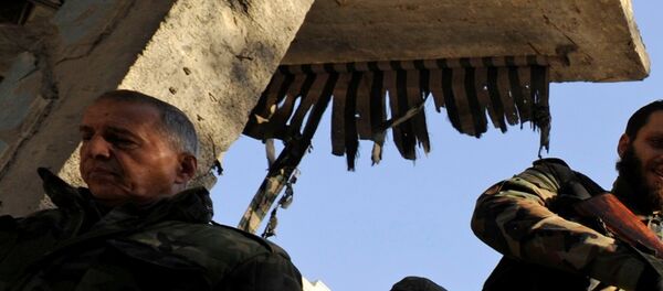 Les forces armées fidèles au président syrien à Alep, le 9 décembre 2016 - Sputnik Afrique