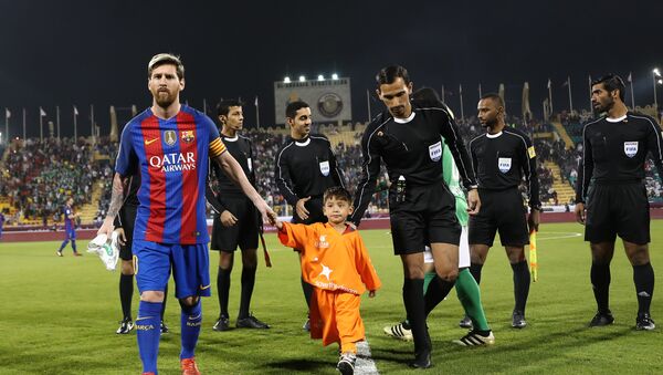 Lionel Messi et Murtaza Ahmadi - Sputnik Afrique