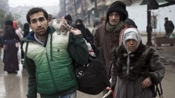 les civils syriens quittent Alep - Sputnik Afrique