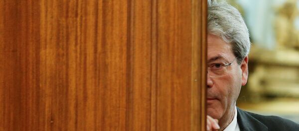 Italian Prime Minister-designate Paolo Gentiloni leaves at the end of a meeting at the Low Chamber in Rome, Italy December 12, 2016. - Sputnik Afrique