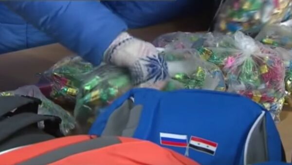 Россия собирает подарки сирийским детям - Sputnik Afrique