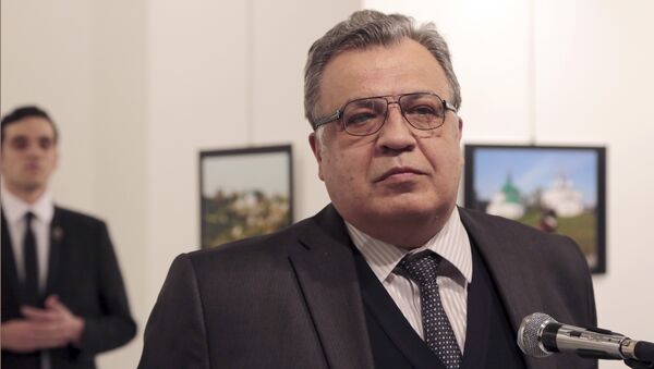 Andrei Karlov, the Russian Ambassador to Turkey, speaks at a photo exhibition in Ankara on Monday, Dec. 19, 2016, moments before a gunman opened fire on him - Sputnik Afrique