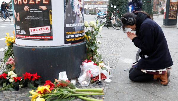 Gedenken der Opfer der Tragödie auf Berliner Weihnachtsmarkt - Sputnik Afrique