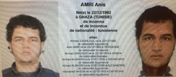 A police record with the title, Urgent Distribution (Top) and Very dangerous individual who could be armed (Bottom) shows suspect Anis Amri who is sought in relation with Monday's truck attack on a Christmas market in Berlin. - Sputnik Afrique